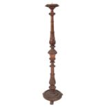 A Continental carved and giltwood torchere stand,