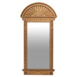 A giltwood and composition pier mirror in Regency style,