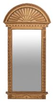 A giltwood and composition pier mirror in Regency style,
