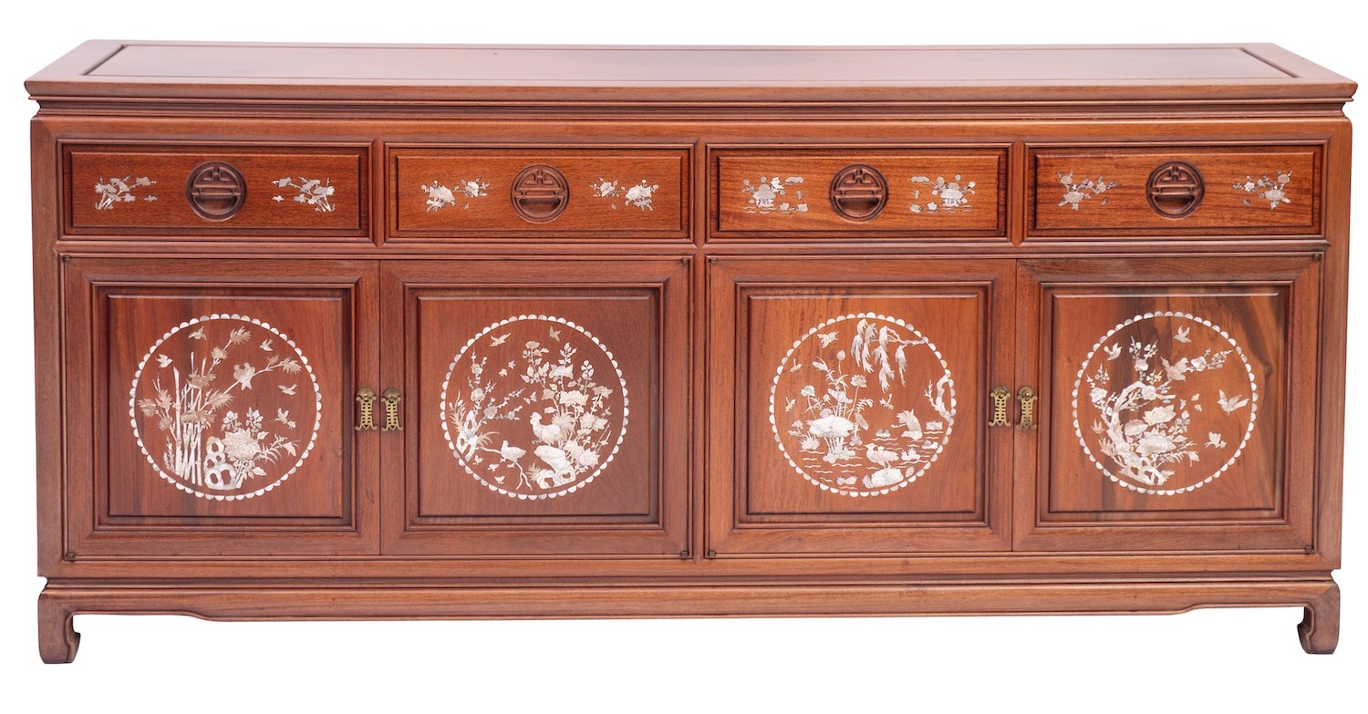 A South East Asian hardwood, mother-of-pearl inset and glazed display cabinet,