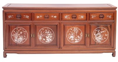 A South East Asian hardwood, mother-of-pearl inset and glazed display cabinet,