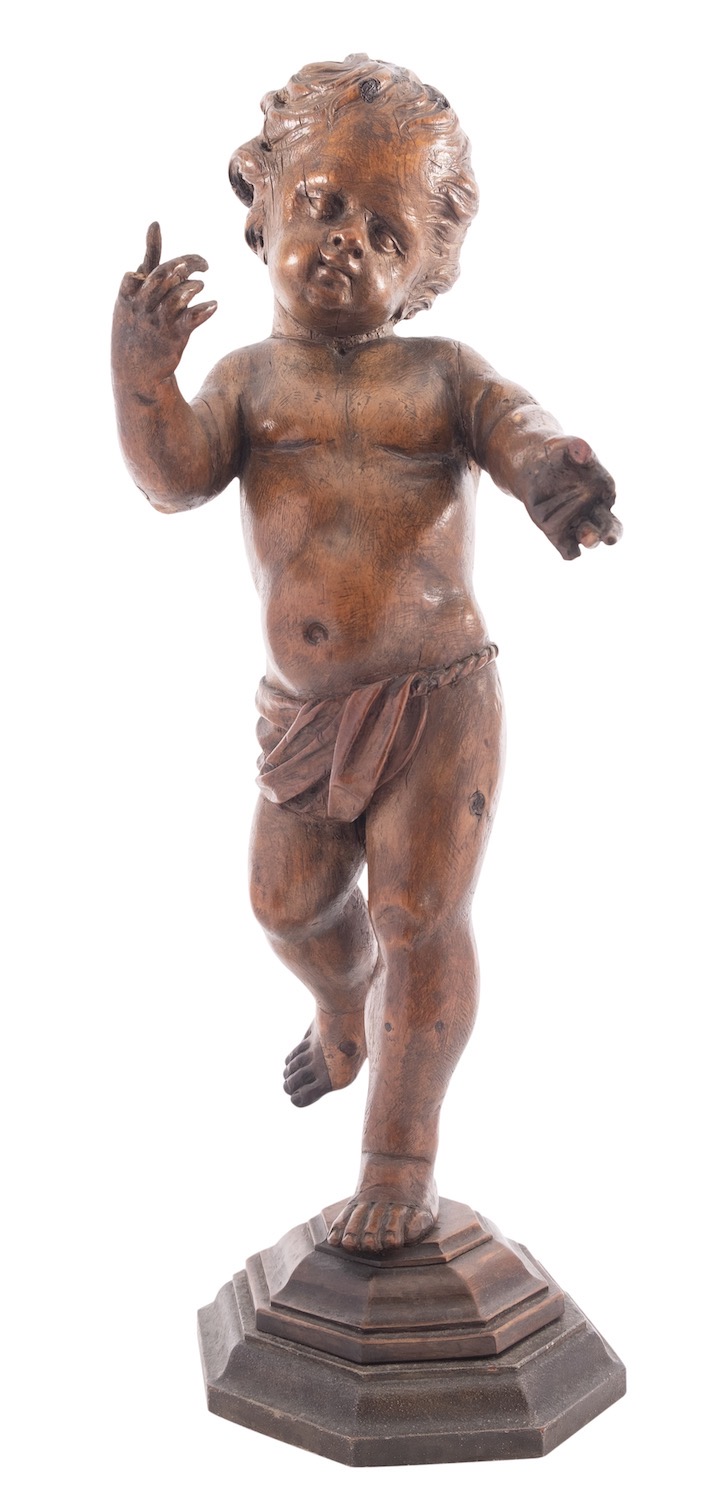 A Continental carved limewood model of a putto, probably Austro-German,