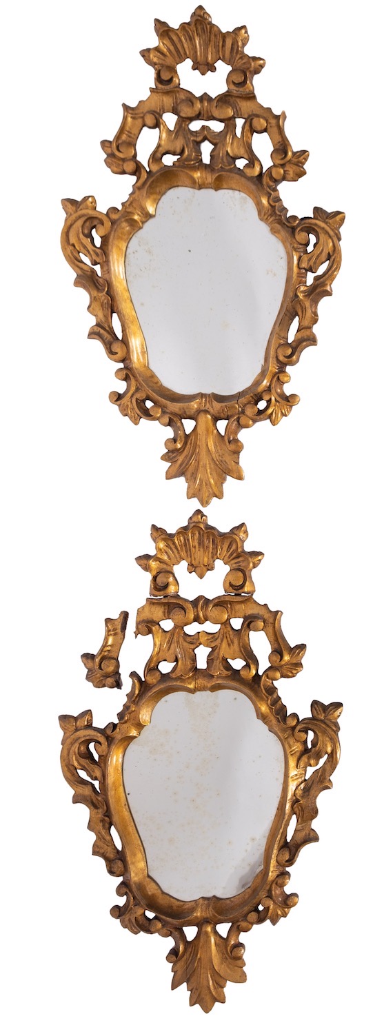 A pair of carved and giltwood framed wall mirrors in Continental 18th century style,