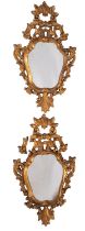 A pair of carved and giltwood framed wall mirrors in Continental 18th century style,