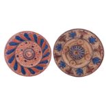 Two Hispano-Moresque lustre pottery chargers both with central bosses,
