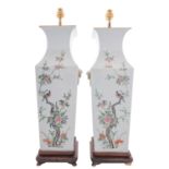 A pair of large Chinese porcelain vases, converted as lamps, of shouldered square profile,
