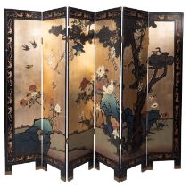 An Oriental painted and lacquered wood six fold screen,