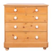 An Edwardian pine chest of drawers,
