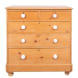 An Edwardian pine chest of drawers,