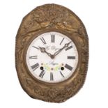 Dognon, Saujon, a French brass repoussé wall clock,