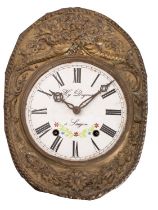 Dognon, Saujon, a French brass repoussé wall clock,