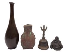 A group of Chinese and Japanese bronzes including a figure of Budai, 7cm high; a Tibetan hand bell,