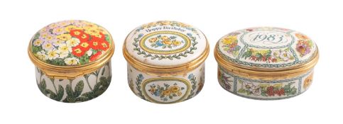 A group of three Halcyon Days enamel boxes including 'Happy Birthday' and '1983',