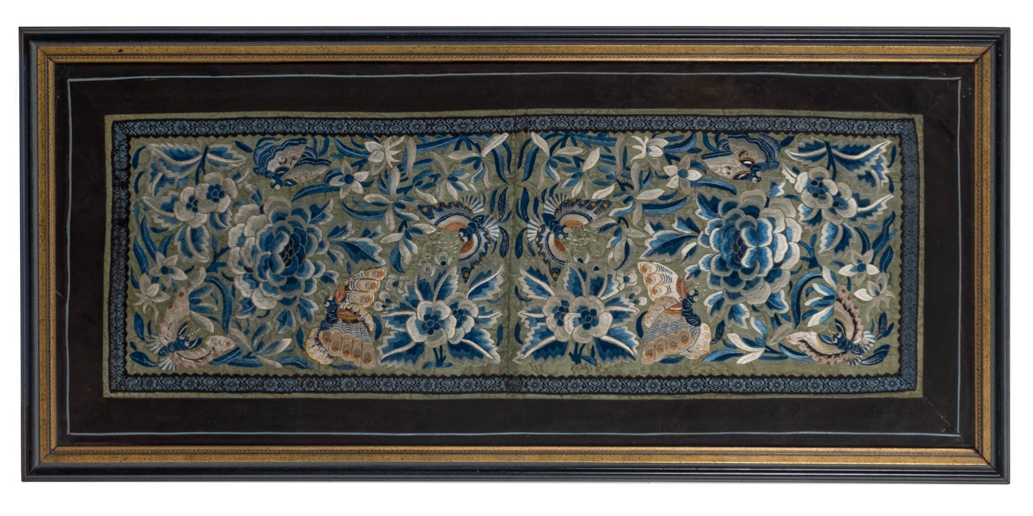 A Chinese framed silkwork panel, depicting butterflies and peony on a green ground, 23 x 28cm.