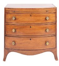 A George IV mahogany and banded bow front chest of drawers,