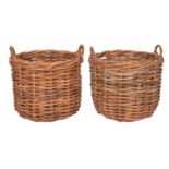 A pair of wicker twin handled log baskets, modern; of cylindrical form; 83cm high overall,