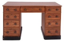 A mahogany pedestal desk in George III style,