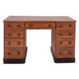 A mahogany pedestal desk in George III style,