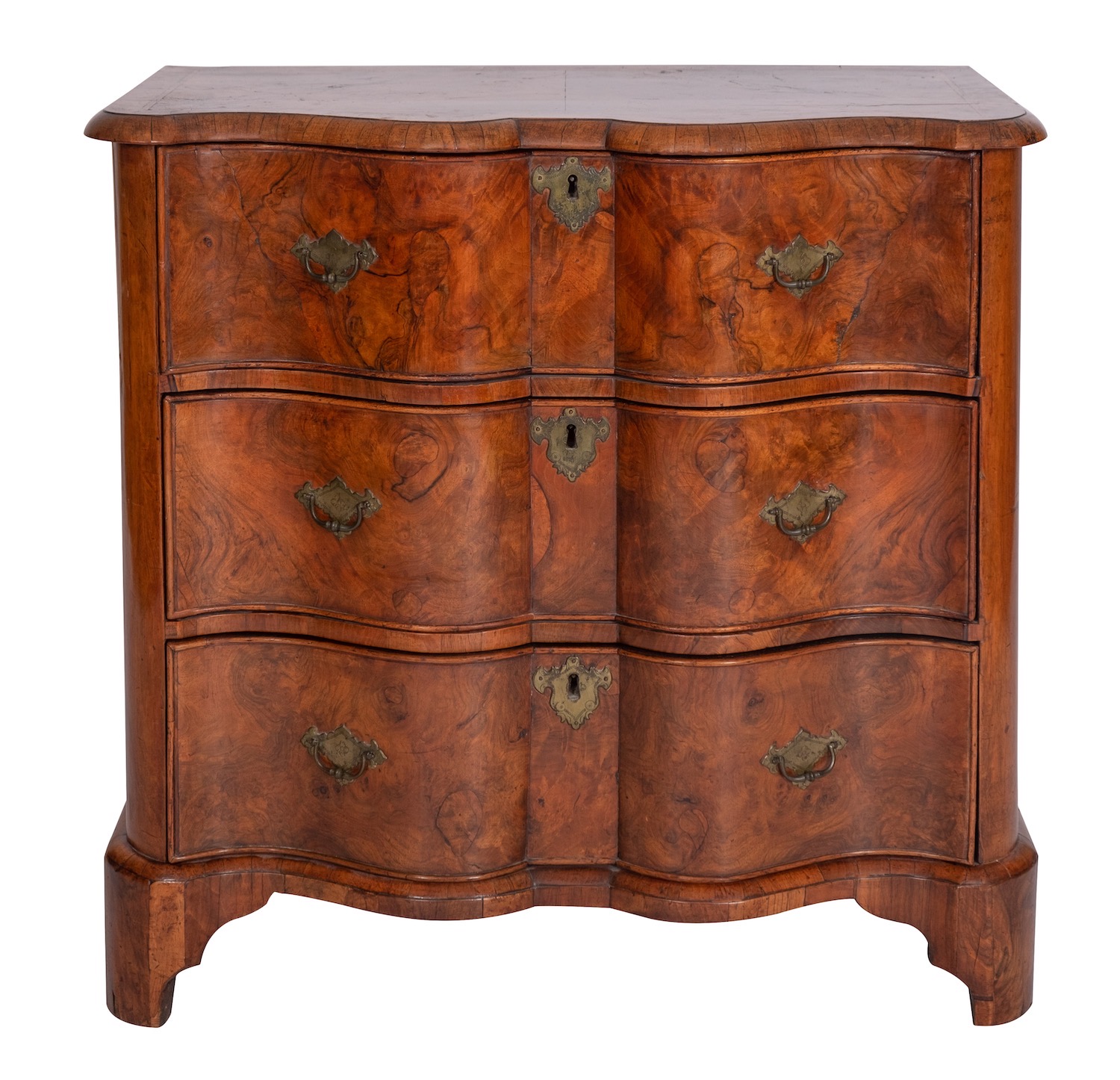 A Continental burr walnut and feather banded serpentine front chest of drawers,