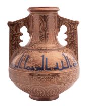 A Hispano Moresque vase of squat form with raised central band and two raised handles profusely
