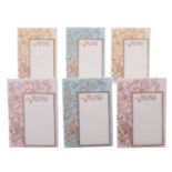 A set of six English porcelain menu cards, early 20th century, with easel supports,