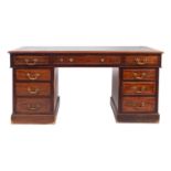 A mahogany pedestal desk in George III style,