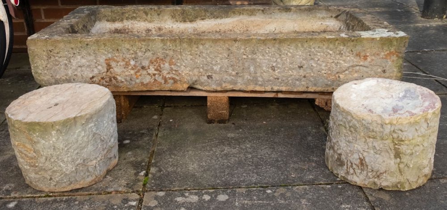 A rough hewn limestone trough, 18th / 19th century; of rectangular form,