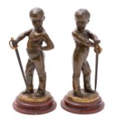 After Louis Kley, (French 1833-1911), a pair of bronze models of boy fencers,