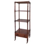 A Regency mahogany whatnot, circa 1815; the brass three-quarter gallery above open shelves,