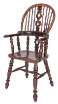 A Victorian yew wood child's Windsor elbow chair,