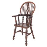 A Victorian yew wood child's Windsor elbow chair,