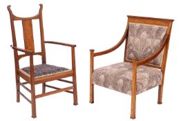 A mahogany and inlaid elbow chair in Art Nouveau style,