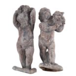 A pair of lead models of putti,