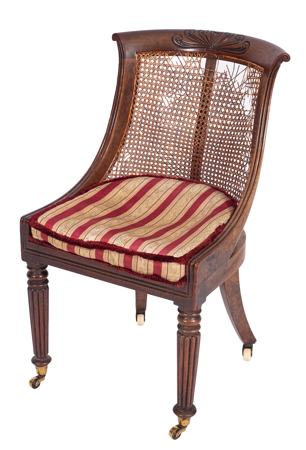 A Regency mahogany and canework library bergere,