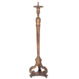 A carved and giltwood standard lamp in Baroque taste,