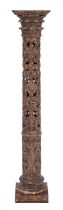 A Continental, probably Spanish carved and silvered wood columnar pedestal, in Baroque style,