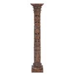 A Continental, probably Spanish carved and silvered wood columnar pedestal, in Baroque style,