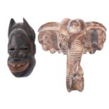 An African carved softwood mask in the form of an elephant, second half 20th century, 40cm high,