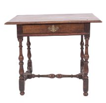 A William and Mary oak side table, late 17th century; the top with moulded edges,