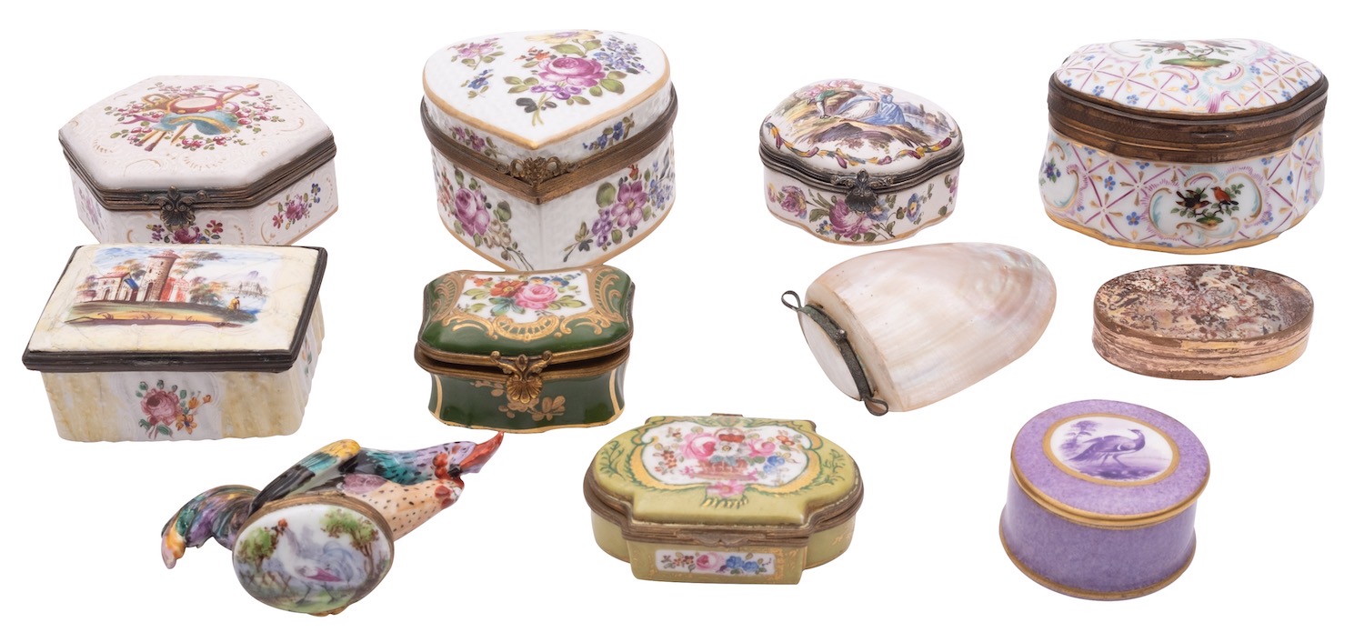 A collection of enamelled and painted ceramic boxes,