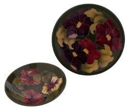 A William Moorcroft 'Hibiscus' footed bowl and a similar 'Anemone' dish both with impressed marks