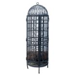 A painted wrought iron wine cage, second half 20th century; of fully openwork cylindrical form,