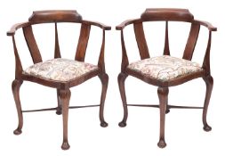 A pair of Edwardian stained hardwood and line inlaid corner chairs,