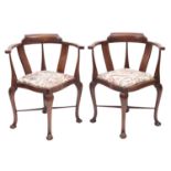 A pair of Edwardian stained hardwood and line inlaid corner chairs,