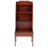 An Edwardian mahogany and boxwood strung open bookcase,