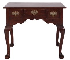 A George II mahogany 'lowboy' side table, mid 18th century; the top with moulded edges,