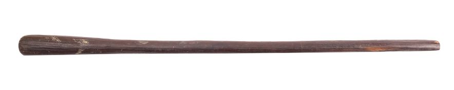 A carved hardwood throwing club, possibly Aboriginal Australian,