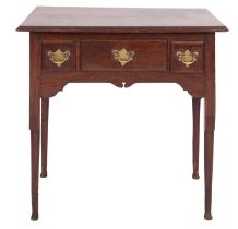 A George II oak lowboy side table, mid 18th century; the top with moulded edges,