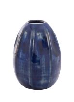 A Martin Brothers' stoneware miniature gourd vase of ribbed form, glazed in blue,