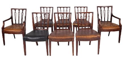 A set of eight late George III mahogany and leather upholstered dining chairs,